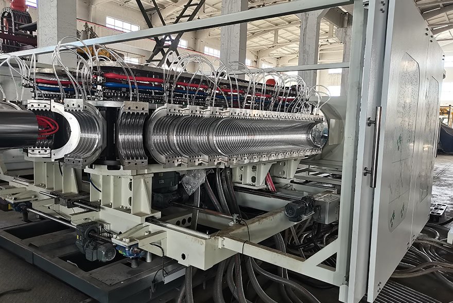 Double wall corrugated pipe extrusion line