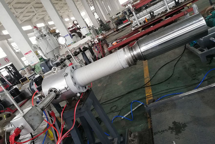 Double wall corrugated pipe extrusion line