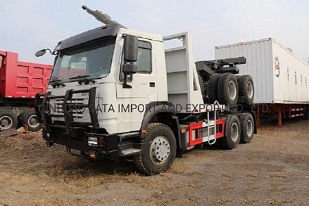 Седельный тягач HOWO с полуприцепом для перевозки лесоматериалов