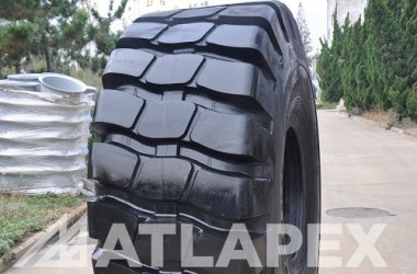 Новая конструкция шины ATLAPEX 29.5-25 E-4/L-4, радиальный рисунок протектора с прочным каркасом и боковиной.