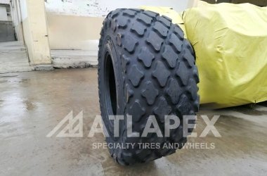 Шина для дорожного катка ATLAPEX 23.1-26 C-2 AT-COM: высококачественная шина для внедорожной техники, предназначенная для уплотнительных работ.