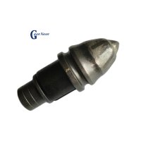 Буровая установка цилиндрического типа для бурения грунта с пулевидными зубьями