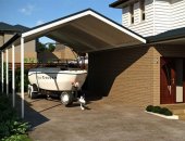 #_0000_Photo of a carport and a speed boat