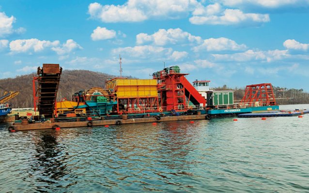 Large chain bucket dredger